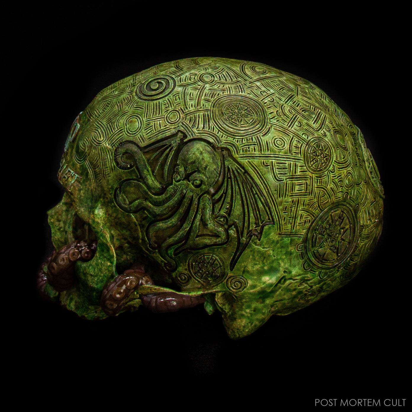 Detail of the verdigris and oxidized copper patina applied by hand for an aged effect.