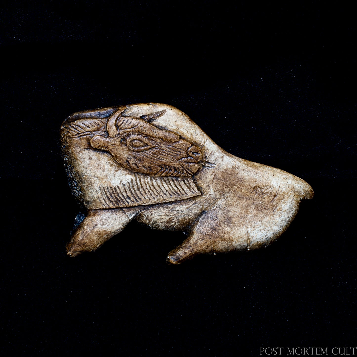 Handcrafted replica of the famous Bison Licking Its Flank, one of the most iconic masterpieces of Upper Paleolithic portable art. The curved posture and flowing silhouette capture the remarkable sense of movement characteristic of Magdalenian sculpture.