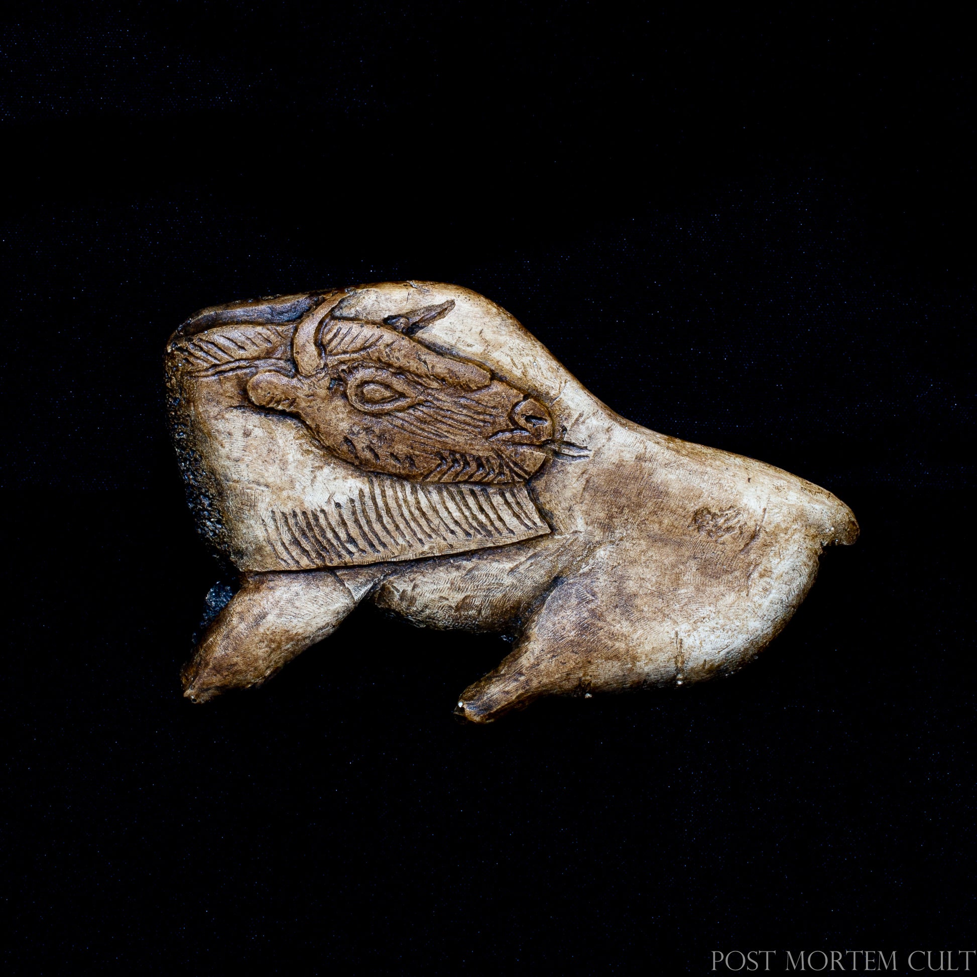 Handcrafted replica of the famous Bison Licking Its Flank, one of the most iconic masterpieces of Upper Paleolithic portable art. The curved posture and flowing silhouette capture the remarkable sense of movement characteristic of Magdalenian sculpture.