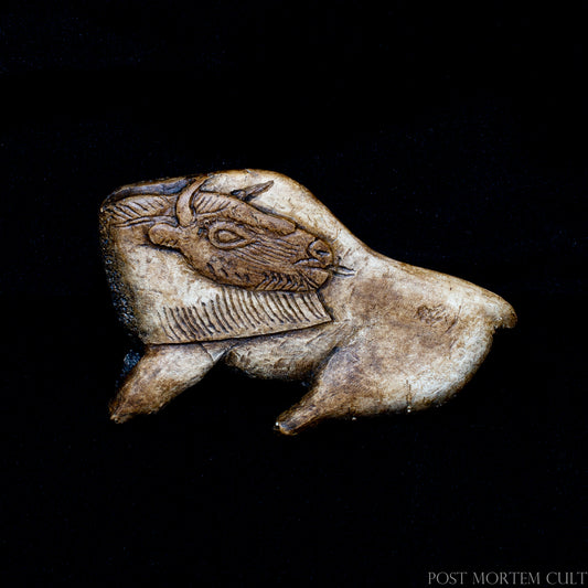 Handcrafted replica of the famous Bison Licking Its Flank, one of the most iconic masterpieces of Upper Paleolithic portable art. The curved posture and flowing silhouette capture the remarkable sense of movement characteristic of Magdalenian sculpture.