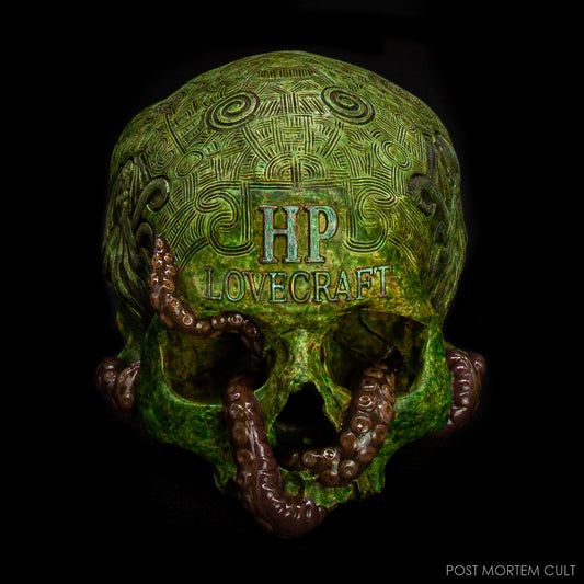 Front view of the H. P. Lovecraft Skull showing the engraved name and tentacle details.