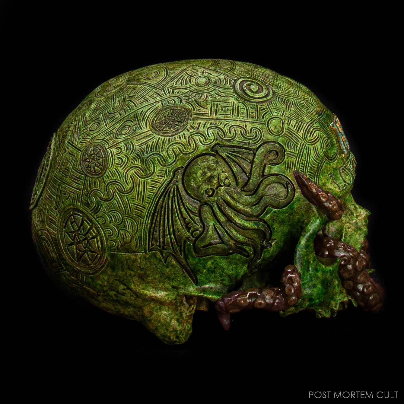 Close-up of the hand-painted tentacles wrapping around the Lovecraft skull.