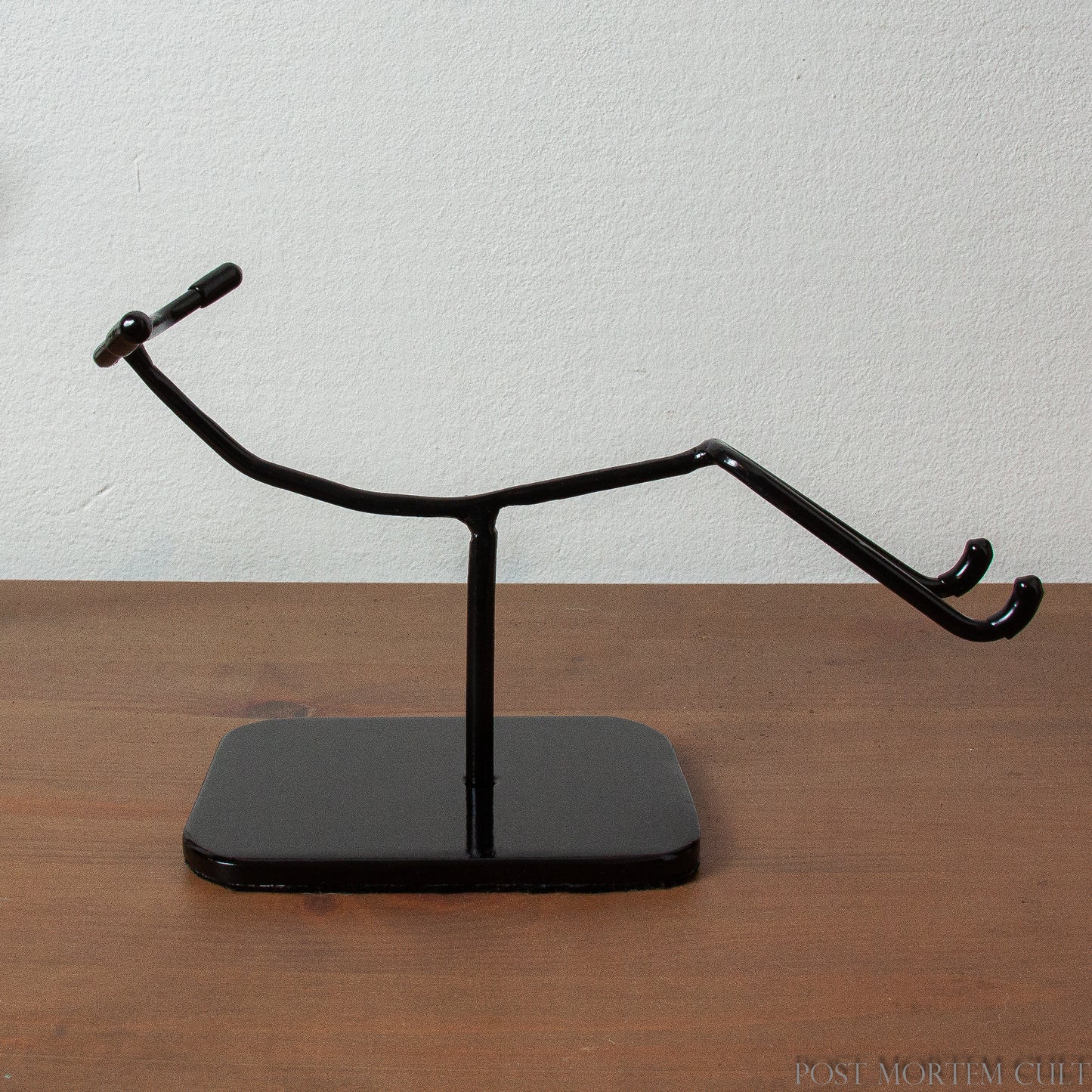 Custom Stand for Elongated Skulls
Exclusively available at Post Mortem Cult, this metal stand is tailored for elongated skulls, offering both aesthetic appeal and stability. The rubber tips and felt base ensure your collection piece is safely showcased.