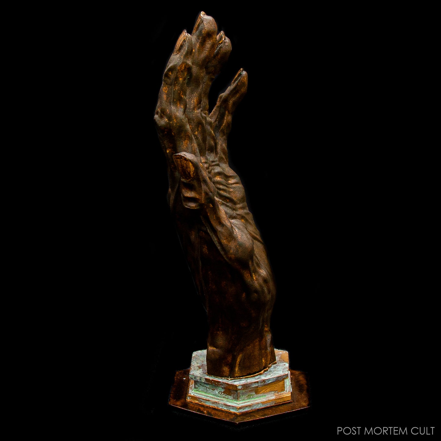 Medieval occult artifact replica displayed on dark textured background.